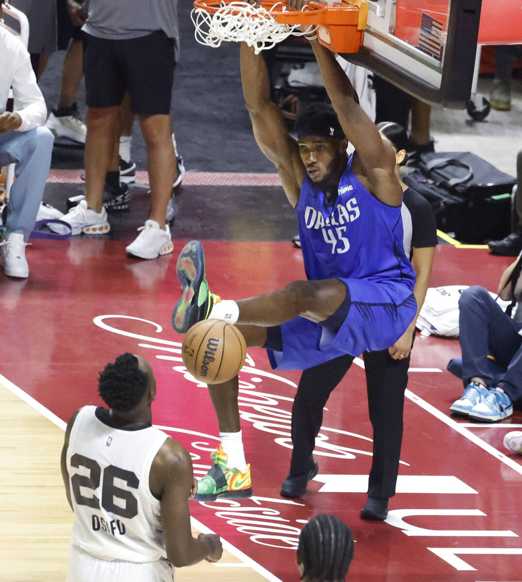 Dallas Mavericks center Moussa Cissé (45) dunks as San Antonio Spurs' forward forward Osay ...