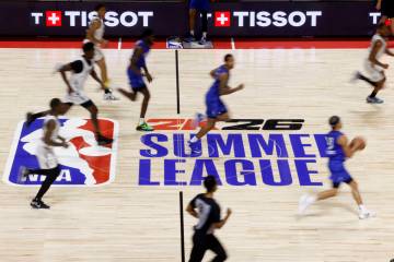 Dallas Mavericks guard Ryan Nembhard dribbles up the court during the third day of the NBA Summ ...