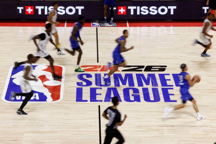 Dallas Mavericks guard Ryan Nembhard dribbles up the court during the third day of the NBA Summ ...