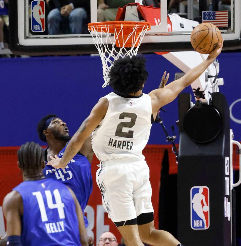 San Antonio Spurs' guard Dylan Harper (2) dunks against San Antonio Spurs during the third day ...