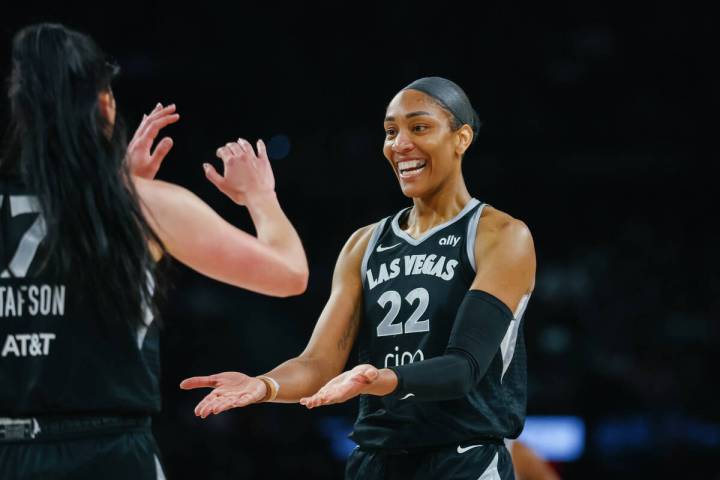 Las Vegas Aces center A'ja Wilson (22) celebrates two points made by teammate Las Vegas Aces ce ...