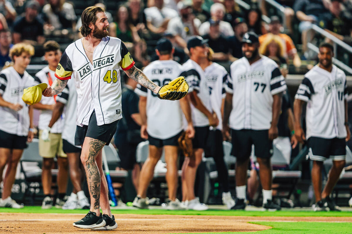 Washington Capitals goaltender Logan Thompson shrugs as he walks off the field during a Battle ...