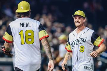 Golden Knights center Jack Eichel celebrates during a Battle For Vegas charity softball game be ...