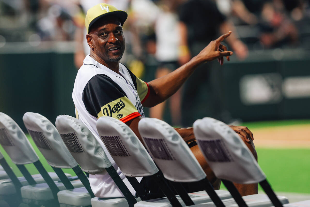 Former MLB center fielder Terrence Long sits during a Battle For Vegas charity softball game be ...