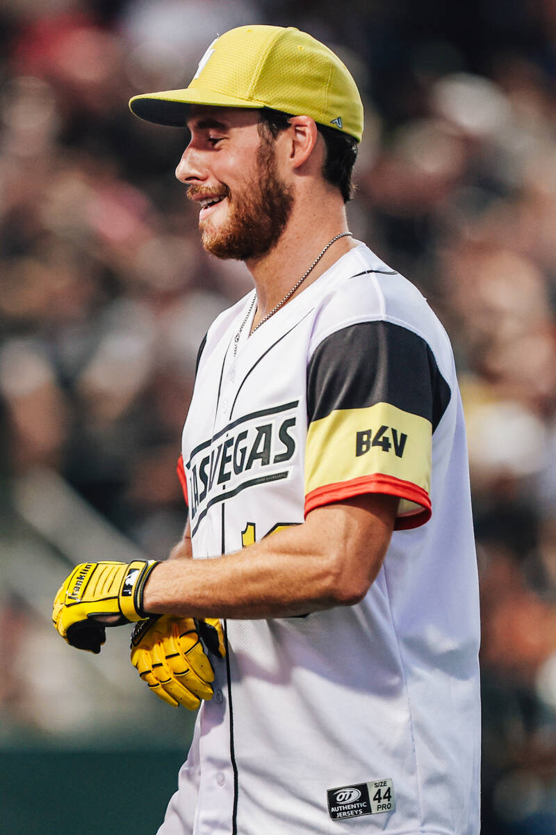 Golden Knights right wing Reilly Smith smiles during a Battle For Vegas charity softball game b ...