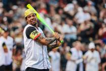 San Jose Sharks right winger Ryan Reaves holds a bat during a Battle For Vegas charity softball ...