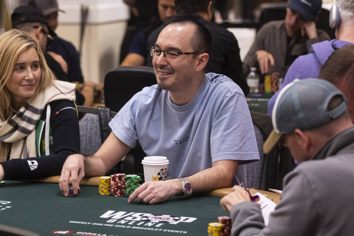 William Kassouf, right, talks while playing alongside Vanessa Kade during day 3 of the World Se ...