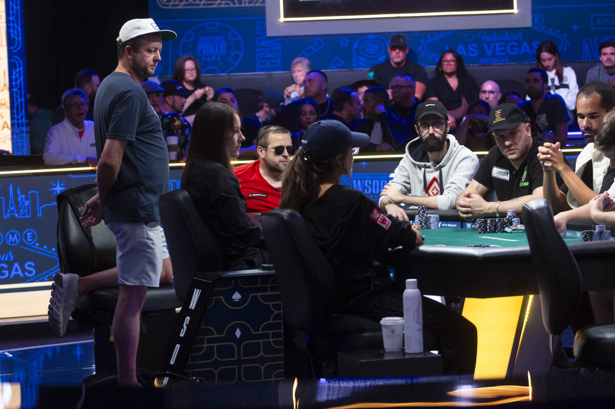 Braxton Dunaway, left, watches the table during day 8 of the World Series of Poker Main Event a ...