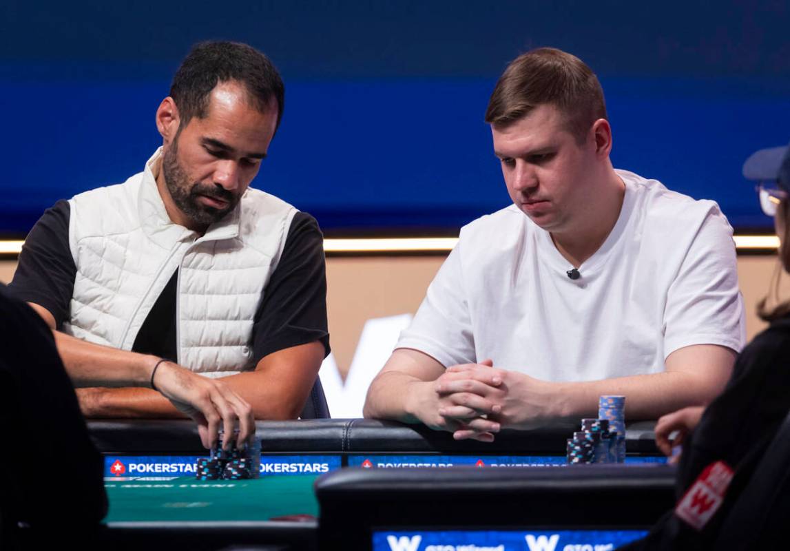 Tony Gregg, left, and Maksim Pisarenko compete during day 8 of the World Series of Poker Main E ...