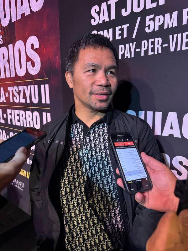Manny Pacquiao speaks about his boxing comeback at a news conference in Los Angeles on Tuesday, ...