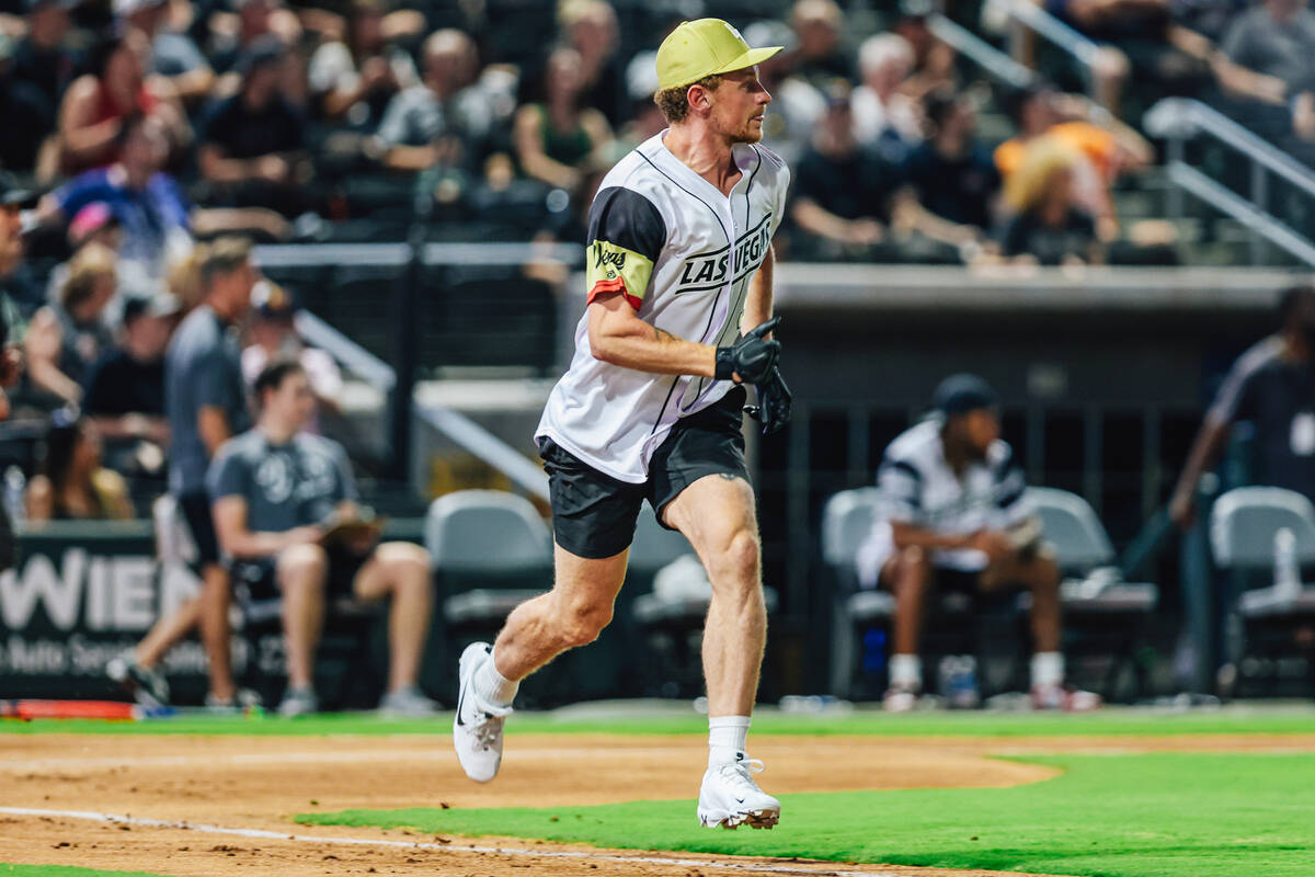 Golden Knights center Jack Eichel runs to first base during a Battle For Vegas charity softball ...