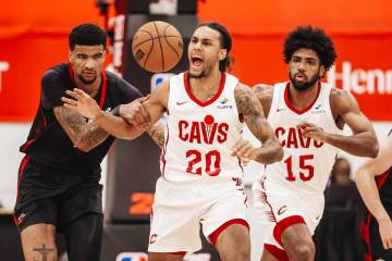 Cleveland Cavaliers guard Jaylon Tyson (20) yells as he chases a loose ball during an NBA Summ ...