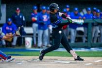 Basic batter Tate Southisene (8) only gets a piece of a pitch from a Reno pitcher in extra inni ...