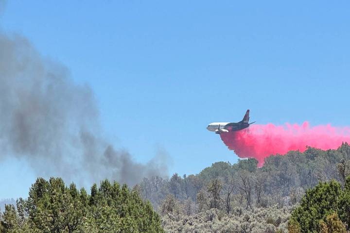 This photo provided by the Bureau of Land Management shows aerial resources working to suppress ...
