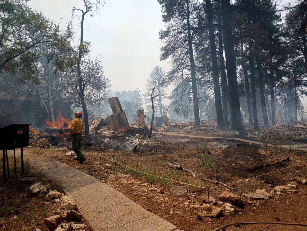 This photo provided by National Park Service shows the charred remains of a building at the Nor ...