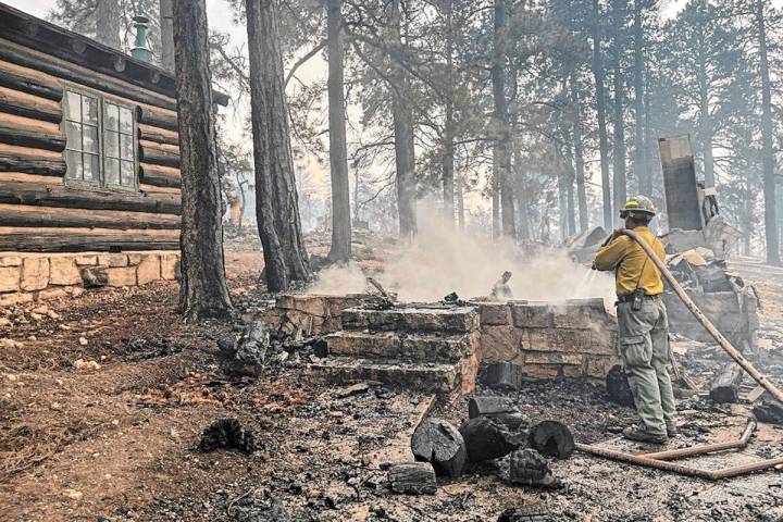 This photo provided by National Park Service shows the charred remains of a building at the Nor ...