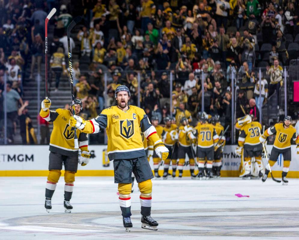 Golden Knights right wing Mark Stone (61) and teammates celebrate their goal and win against th ...