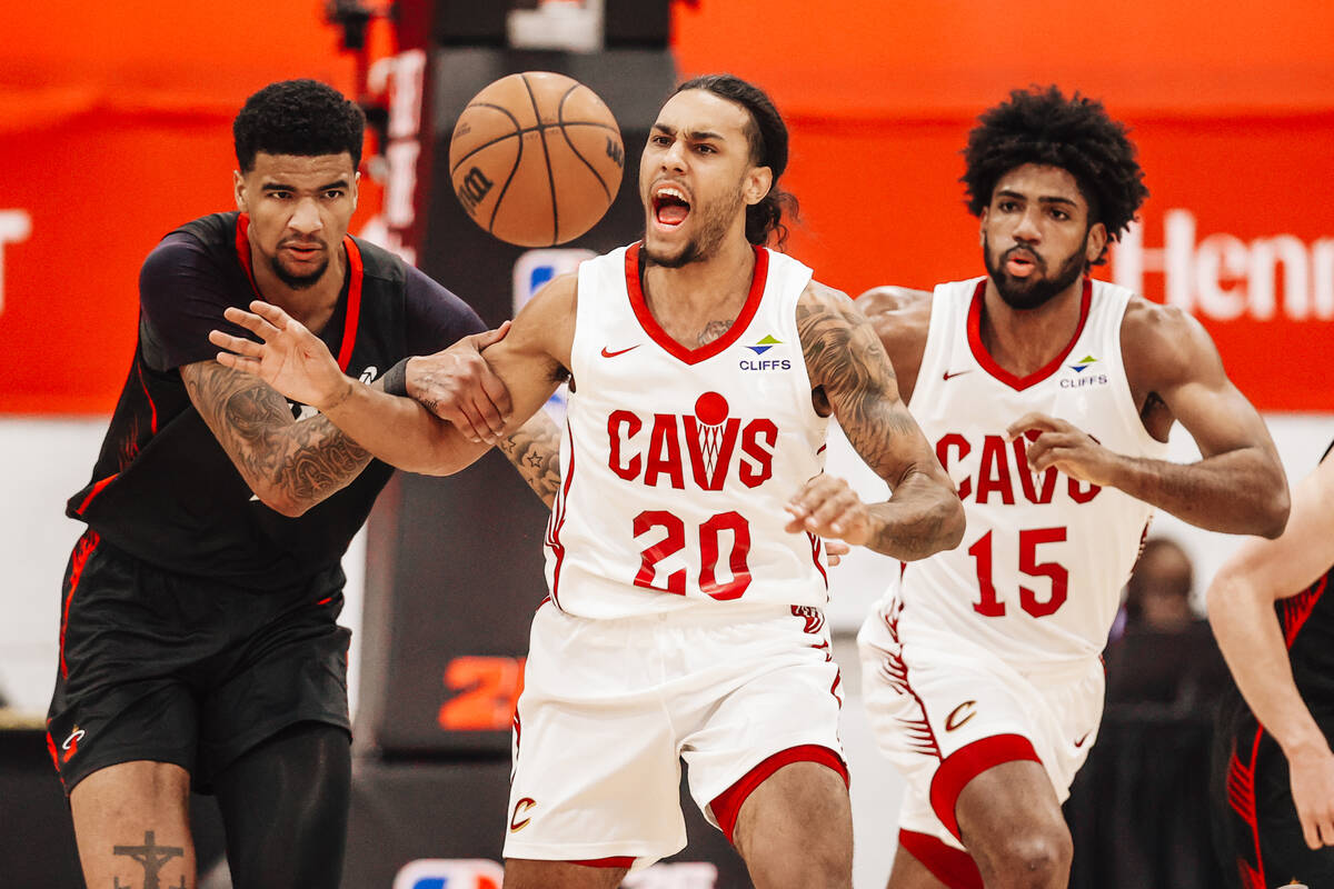 Cleveland Cavaliers guard Jaylon Tyson (20) yells as he chases a loose ball during an NBA Summ ...