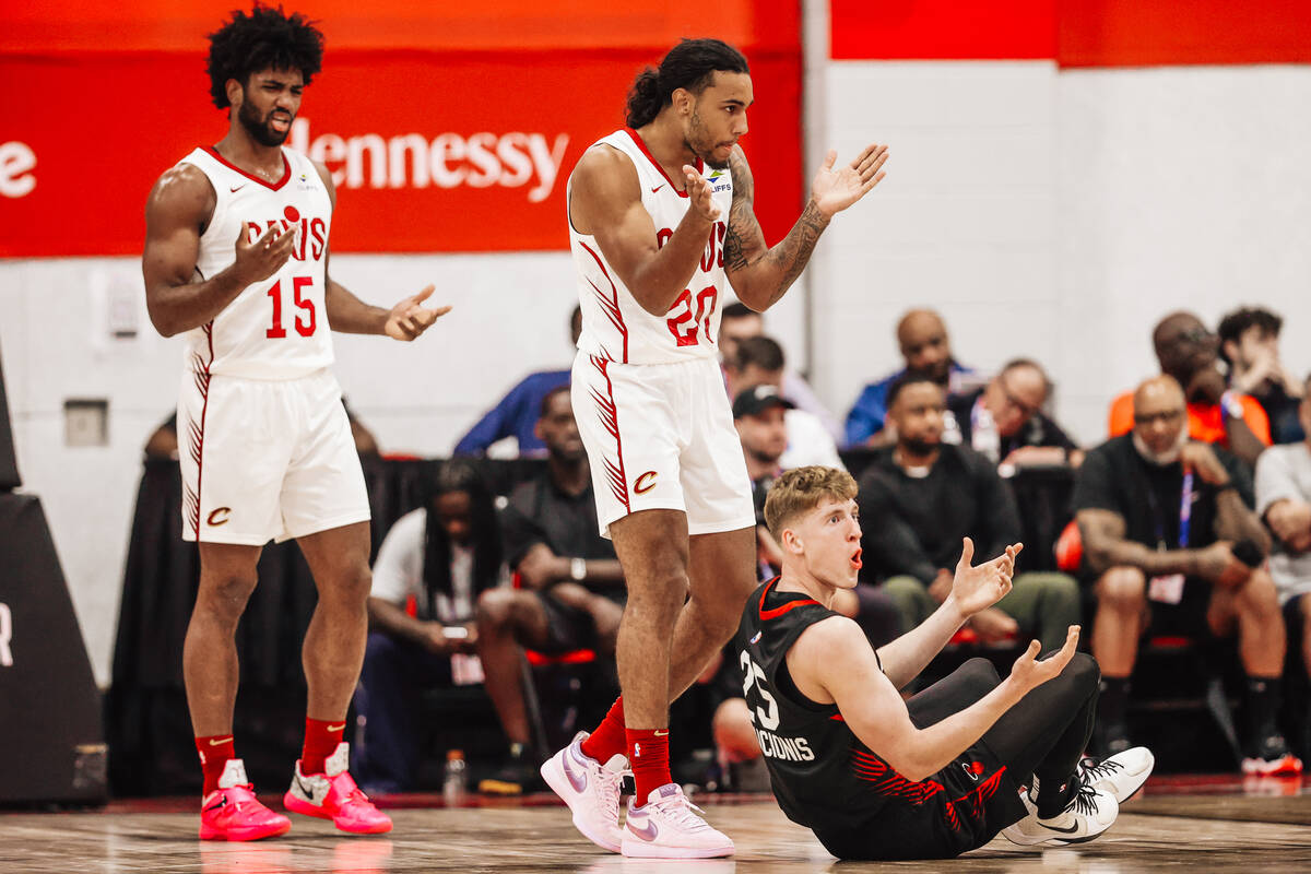 Cleveland Cavaliers guard Jaylon Tyson (20) reacts after drawing a foul from Miami Heat guard K ...