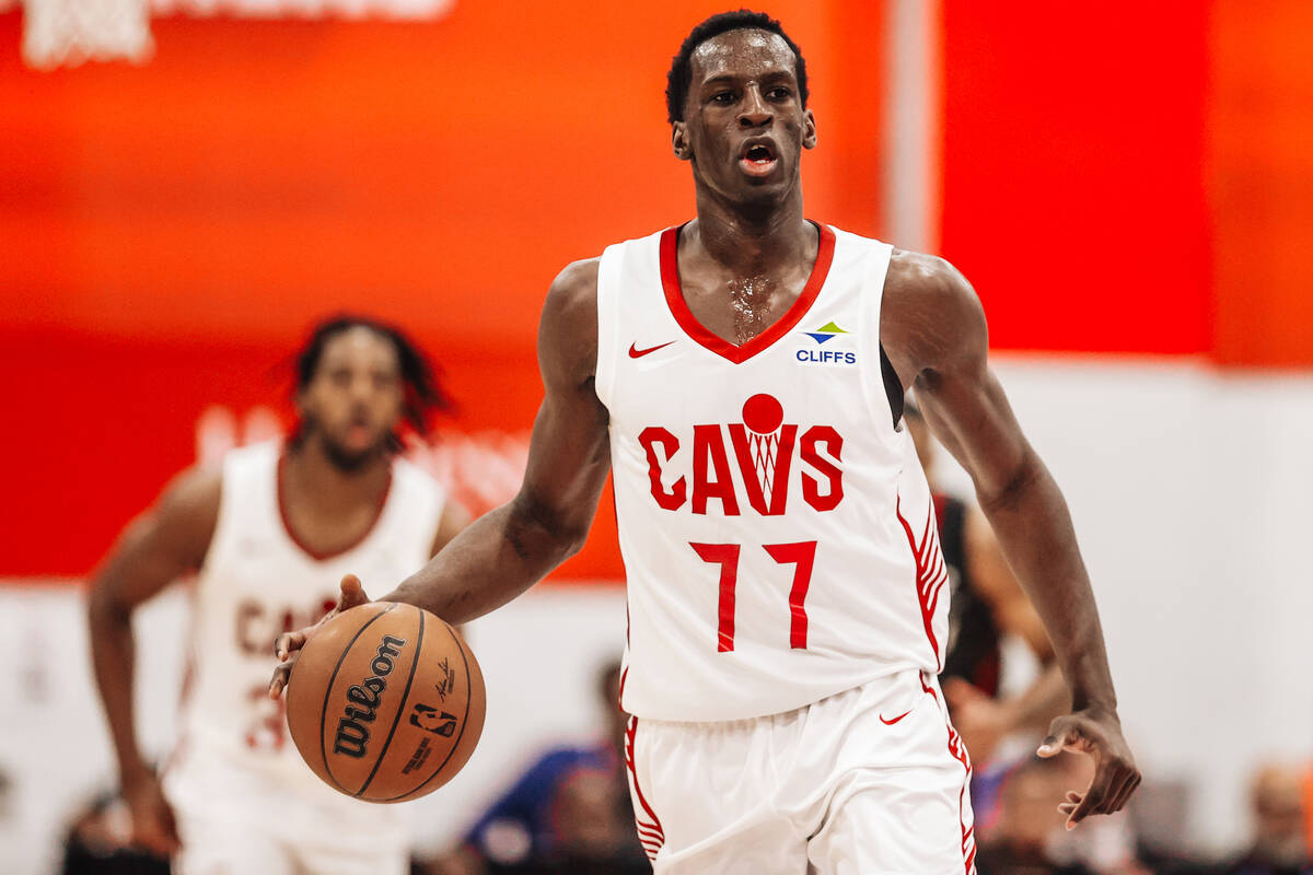 Cleveland Cavaliers forward Saliou Niang dribbles the ball during an NBA Summer League basketba ...