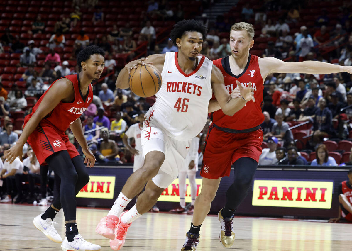 Houston Rockets forward Jermaine Samuels Jr., (46) drives past Atlanta Hawks forward Jack White ...