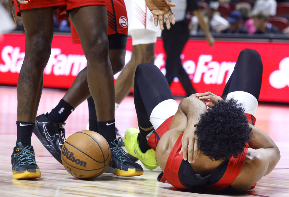 Atlanta Hawks forward Jacob Toppin (00) lies on the floor after being fouled during the NBA Sum ...