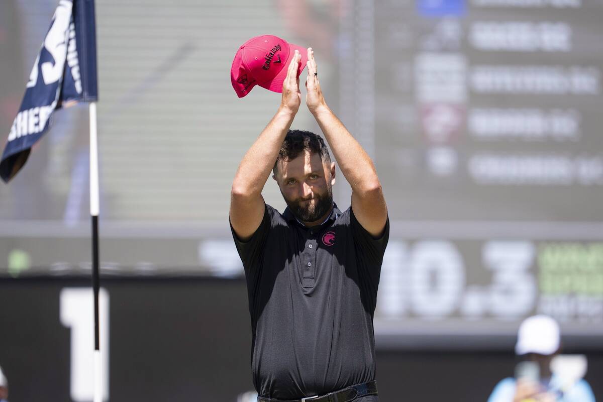 Jon Rahm reacts after his putt on the 18th green during the final round of LIV Golf Andalucía ...
