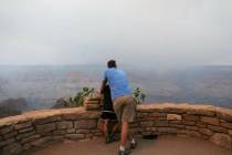 Smoke from the Dragon Bravo Fire moves over the Grand Canyon from the North Rim, Monday, July 1 ...