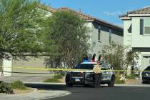 Police investigate a homicide Wednesday, July 9, 2025, in the southwest Las Vegas Valley. (Akiy ...