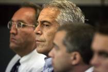 FILE- In this July 30, 2008 file photo, Jeffrey Epstein is shown in custody in West Palm Beach, ...