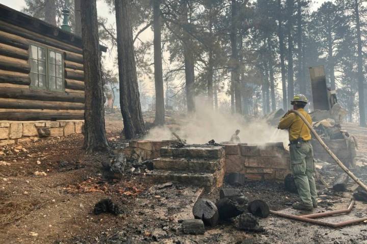 This photo shows the charred remains of a building at the North Rim of Grand Canyon National Pa ...