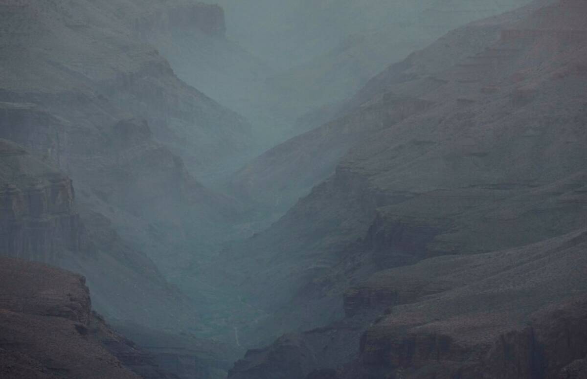 Smoke from the Dragon Bravo Fire moves down the Grand Canyon from the North Rim Tuesday, July 1 ...