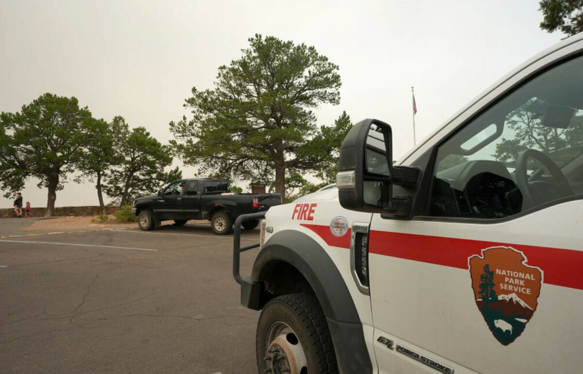 Smoke from the Dragon Bravo Fire moves over the Grand Canyon from the North Rim as a National P ...