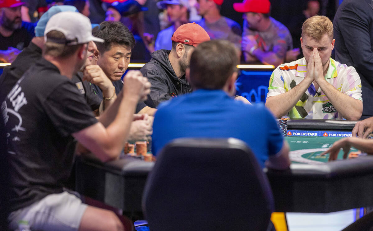 Adam Hendrix of Las Vegas, right, attempts to stay calm on the final table during the World Ser ...