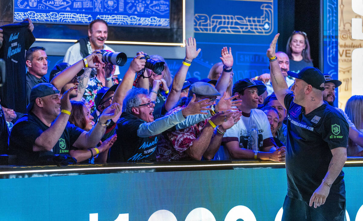 Michael Mizrachi of Miramar, Florida, and supporters are overjoyed after knocking out another o ...