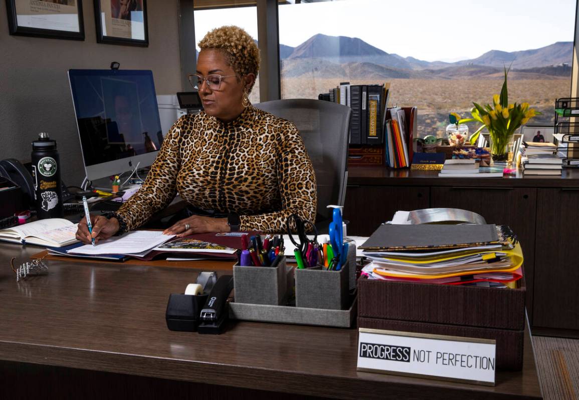 Nevada State College President Dr. DeRionne Pollard works in her office within the James E. And ...