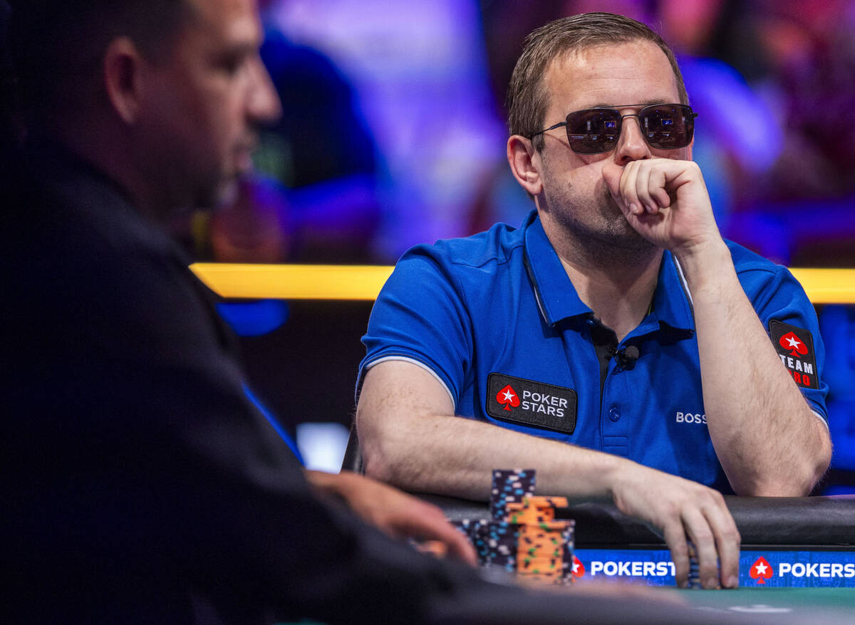 Kenny Hallaert of Belgium watches his competition on the final table during the World Series of ...