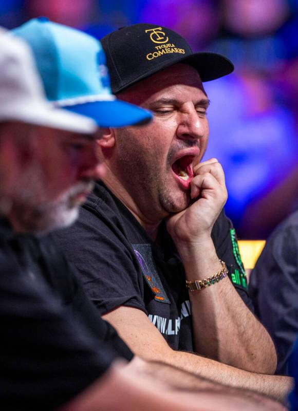 Michael Mizrachi of Miramar, Florida, yawns as play continues on the final table during the Wor ...