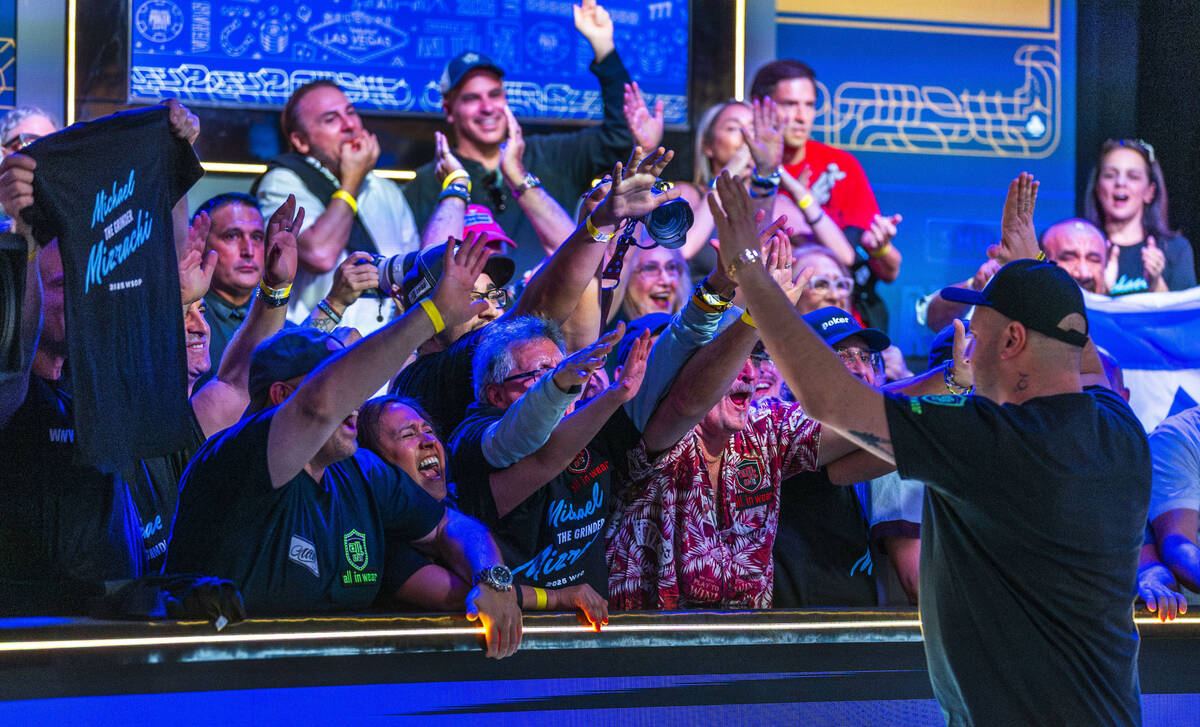 Michael Mizrachi of Miramar, Florida, and supporters are overjoyed after knocking out another o ...