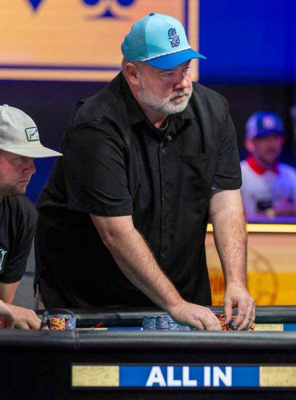 John Wasnock of North Bend, Washington, collects some chips on the final table during the World ...
