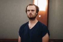 Spencer McDonald, charged with three counts murder and one count of attempted murder, stands in ...