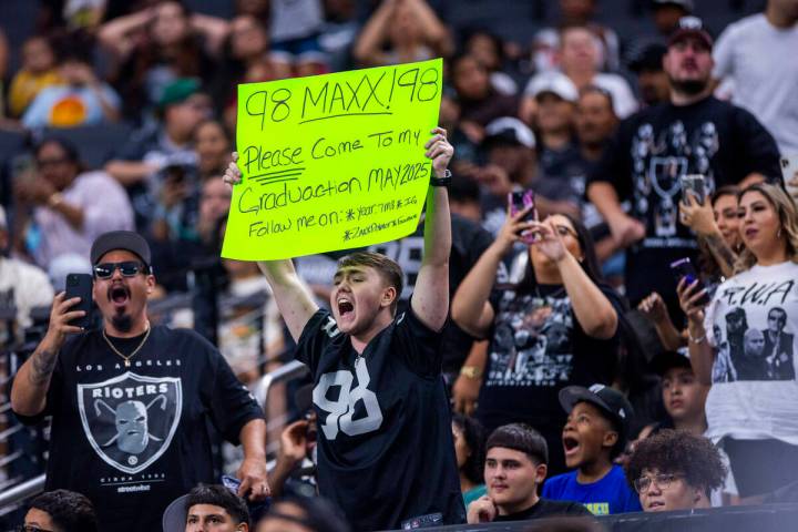 A Raiders fan wants to invite defensive end Maxx Crosby (98) to his graduation during an open p ...