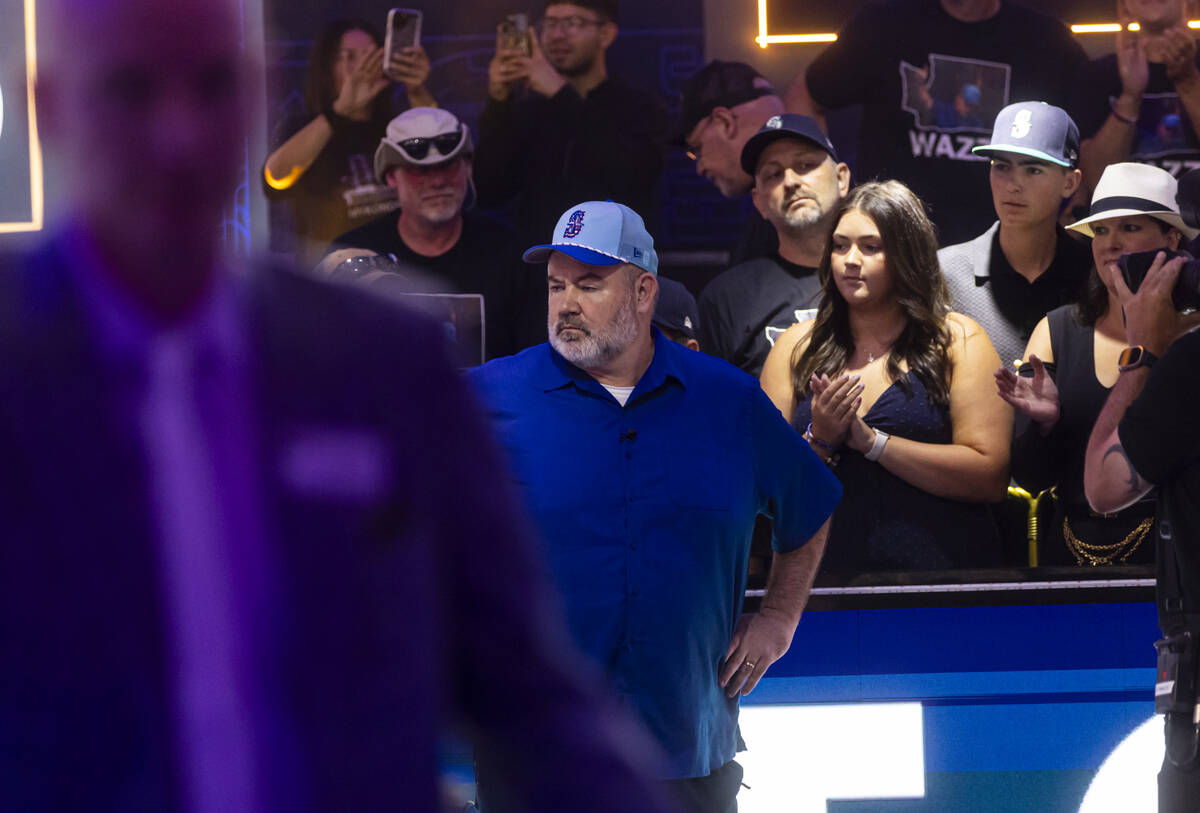 John Wasnock reacts after losing to Michael Mizrachi at the final table during the World Series ...