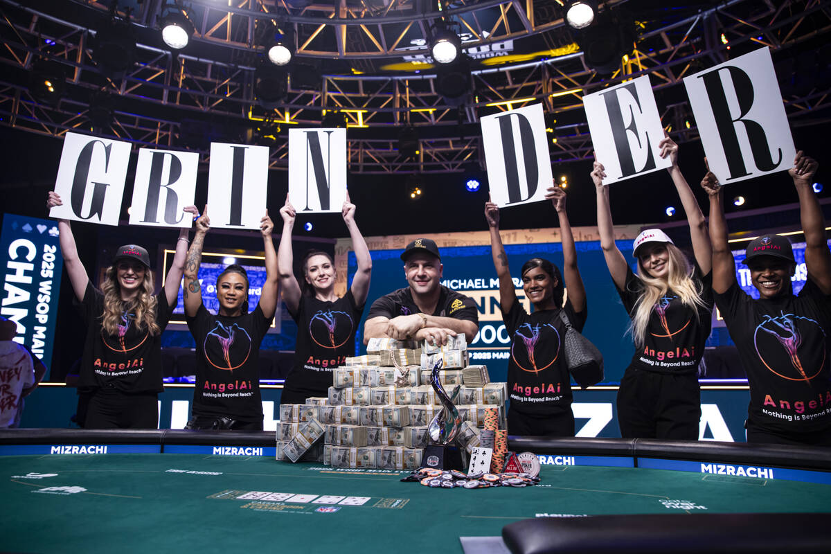 Michael Mizrachi poses with his World Series of Poker Main Event winnings at Horseshoe Las Vega ...