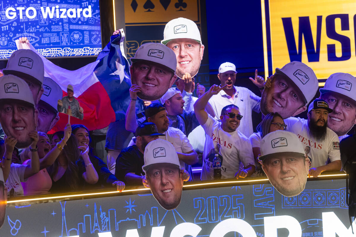 Supporters of Braxton Dunaway cheer during the World Series of Poker Main Event at the Horsesho ...