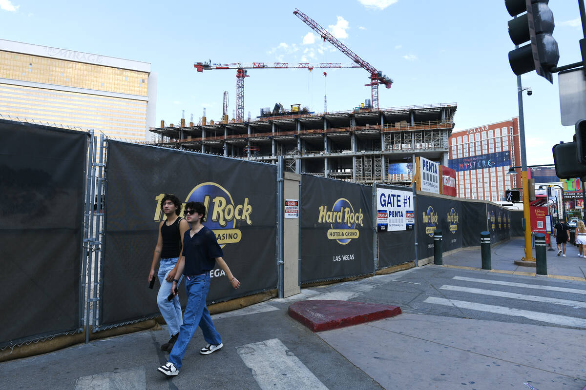 Construction on the Hard Rock Hotel’s guitar tower takes continues on the Strip Friday, ...
