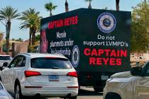 A video billboard truck criticizing Metropolitan Police Department Capt. Landon Reyes cruises L ...