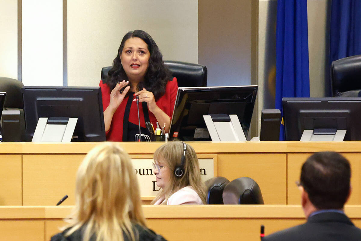 Councilwoman Olivia Diaz, right, gets emotional as she speaks about the redevelopment of Desert ...