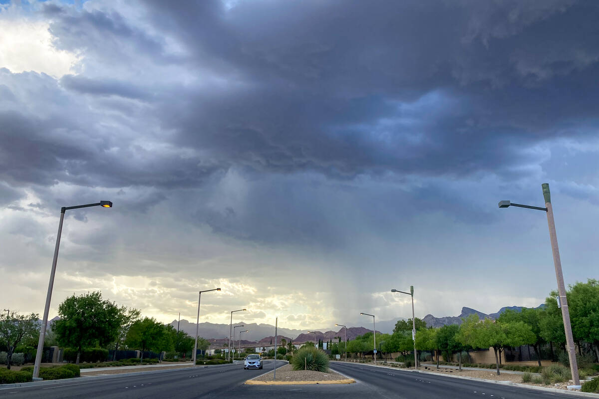 Clouds gather over Charleston Boulevard in Summerlin, looking west, on Thursday. (Eli Segall/La ...