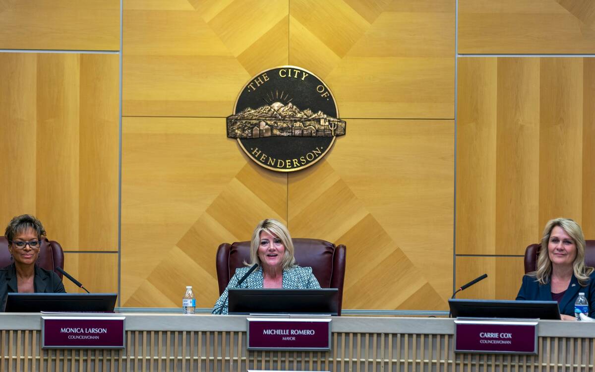 Mayor Michelle Romero, center, Councilwomen Monica Larson, left, and Carrie Cox, right, watch a ...
